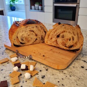 Sliced bread loaf with chocolate and marshmallows.