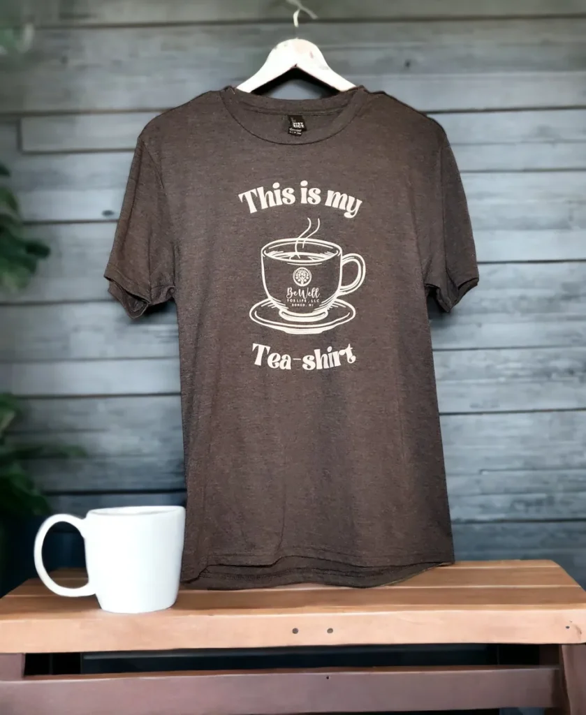 Brown t-shirt with tea-themed design.
