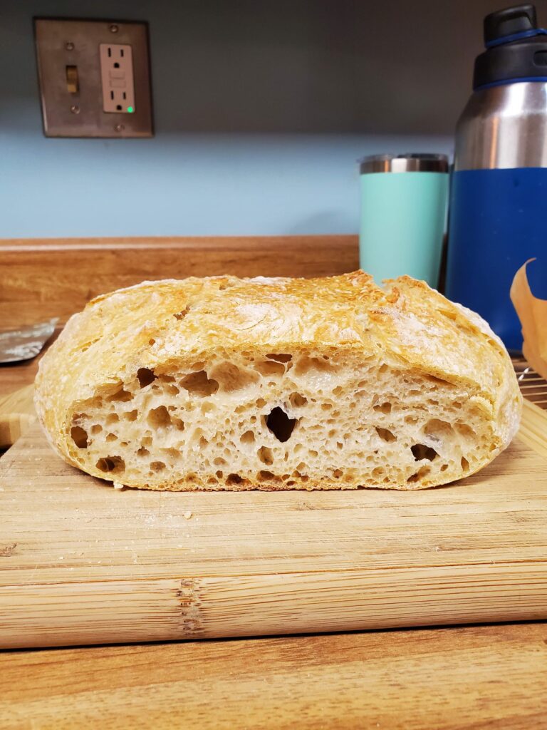flat over proofed sourdough loaf