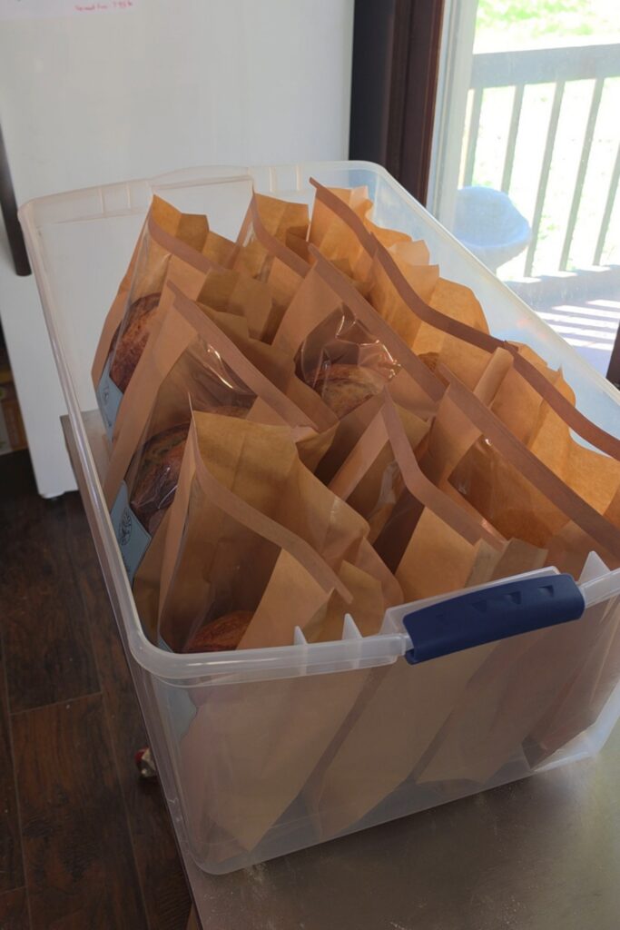 packaged bread in clear bin