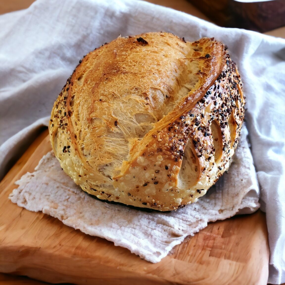 Freshly baked loaf on white cloth